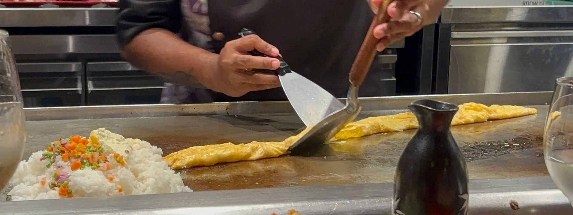 Chef cooking teppanyaki style meal at Warwick Fiji Resort and Spa in Korolevu