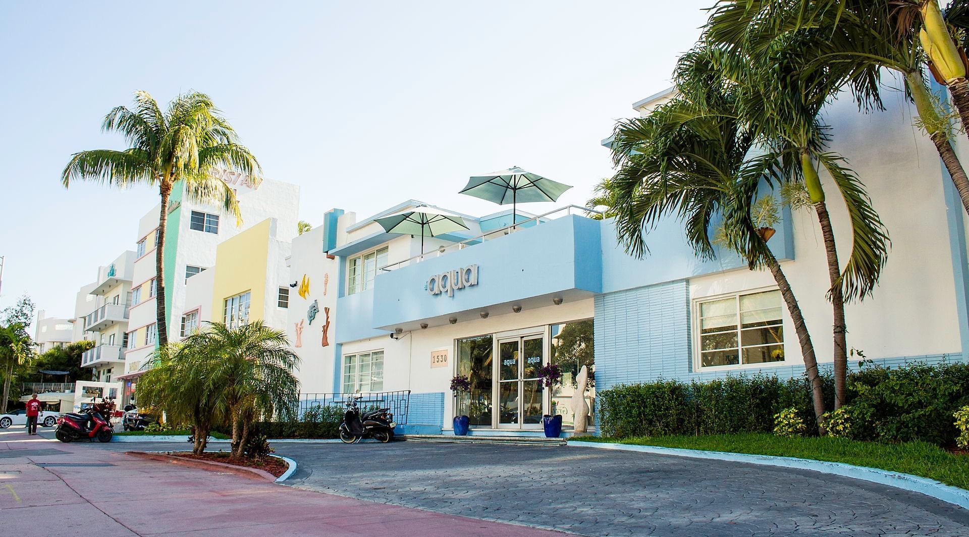The exterior view of the entrance of Aqua Hotel & Suites