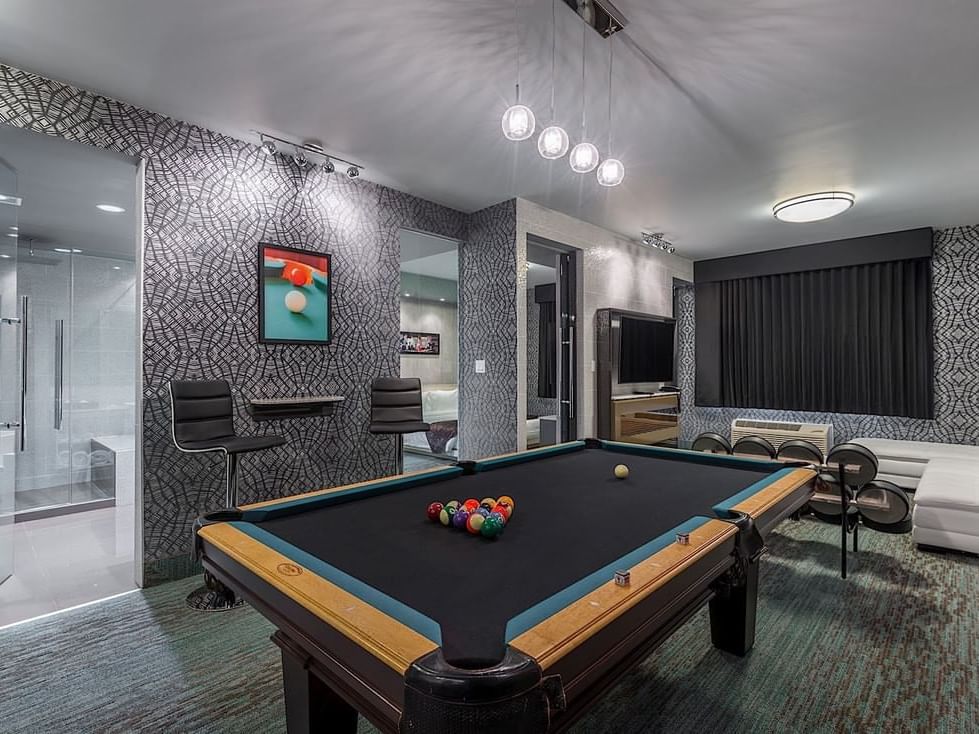 Pool table in Cornerpocket Themed Suite at Hotel Clique Calgary