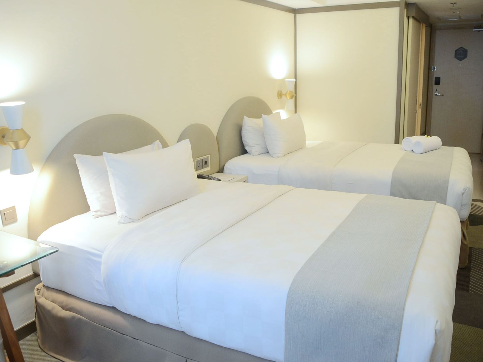 Interior of Deluxe Twin Bed Room at LK Pemuda Semarang Hotel & Residences