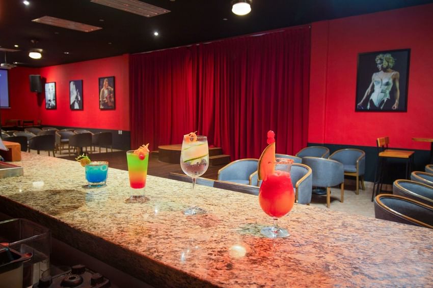 Dining area with 4 varieties of cocktails served in Tequila Dancing Sport Bar at Plaza Pelicanos Club Beach Resort