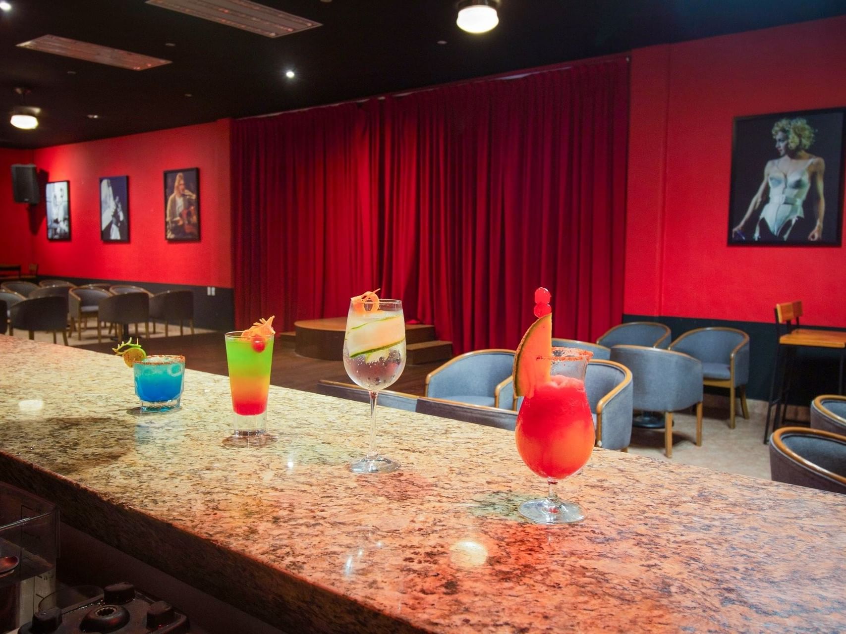 Dining area with 4 cocktails served in Tequila Dancing Sport Bar at Plaza Pelicanos Club Beach Resort