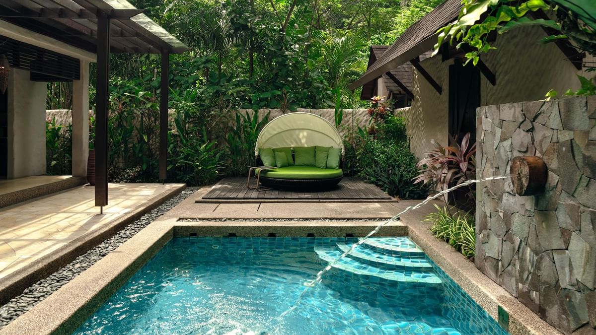 Outdoor pool with a sunbed in Garden Villa at The Banjaran Hotsprings Retreat