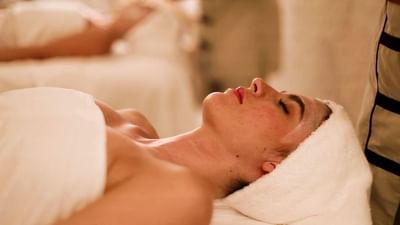 A guest enjoying a relaxing facial and wellness treatment at Serena Spa in Villa Premiere Puerto Vallarta.
