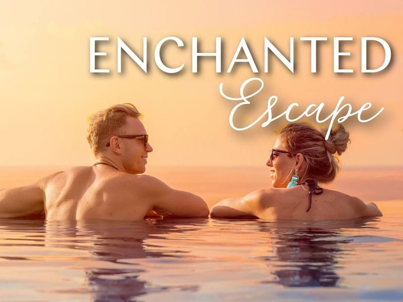Enchanted Escape Hero Image for Sunway Velocity Hotel_Two people relax in a pool at sunset, enjoying the warm ambiance and each other's company.