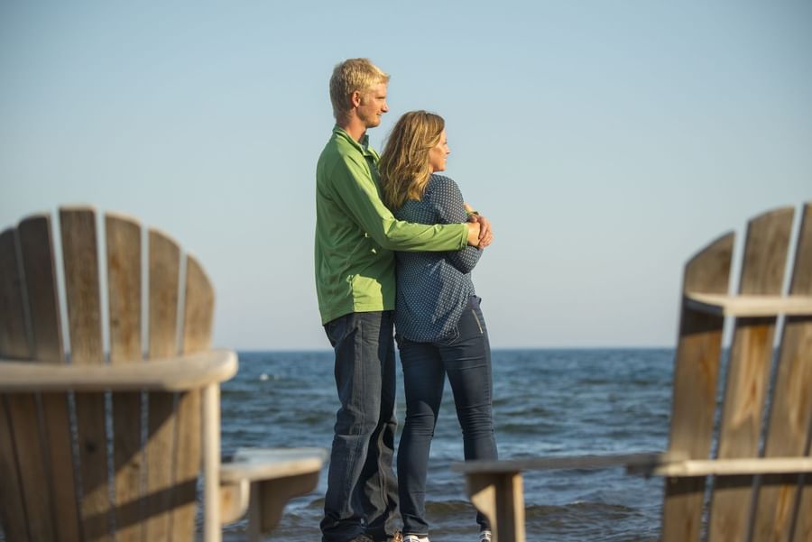A couple looking at the beach near Lutsen Resort