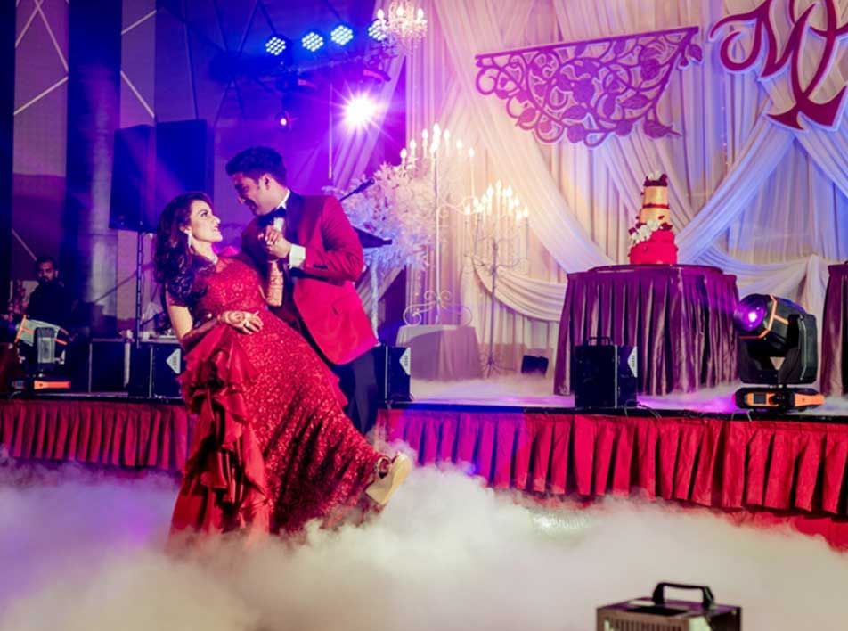 groom dipping the bride during their first dance - Lexis MY