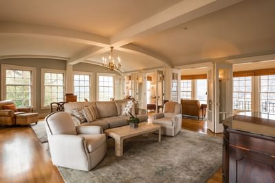 Comfy lounge area with wooden floors in Mt Ada, Catalina Island Company