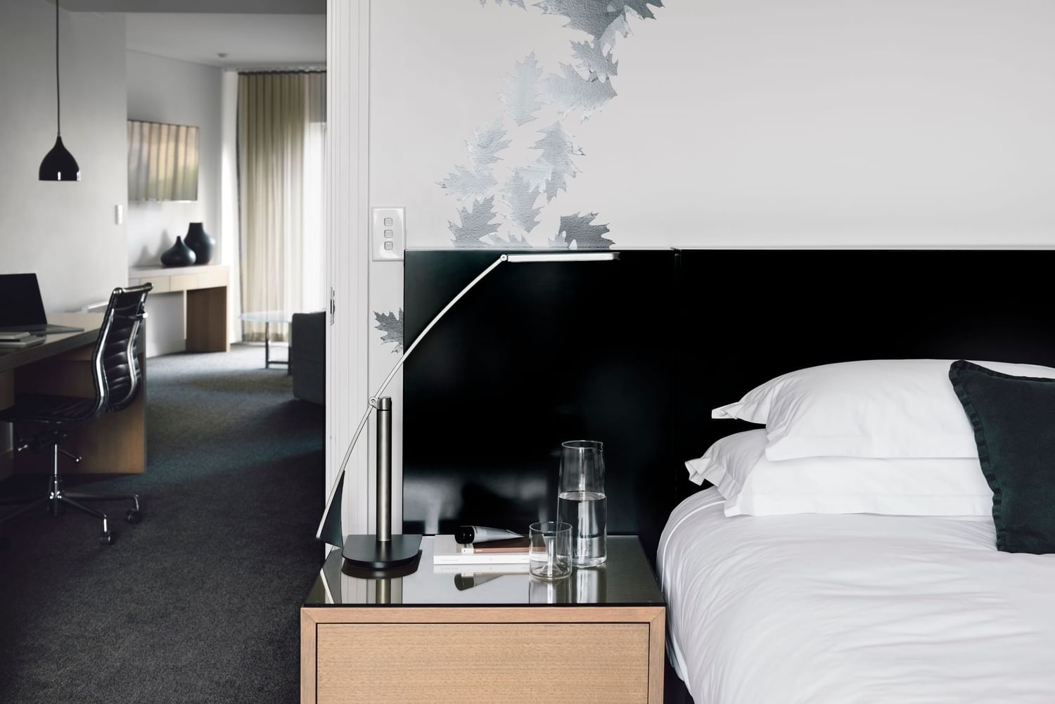 Bed & nightstand in 1 Bedroom Apartment at The Como Melbourne