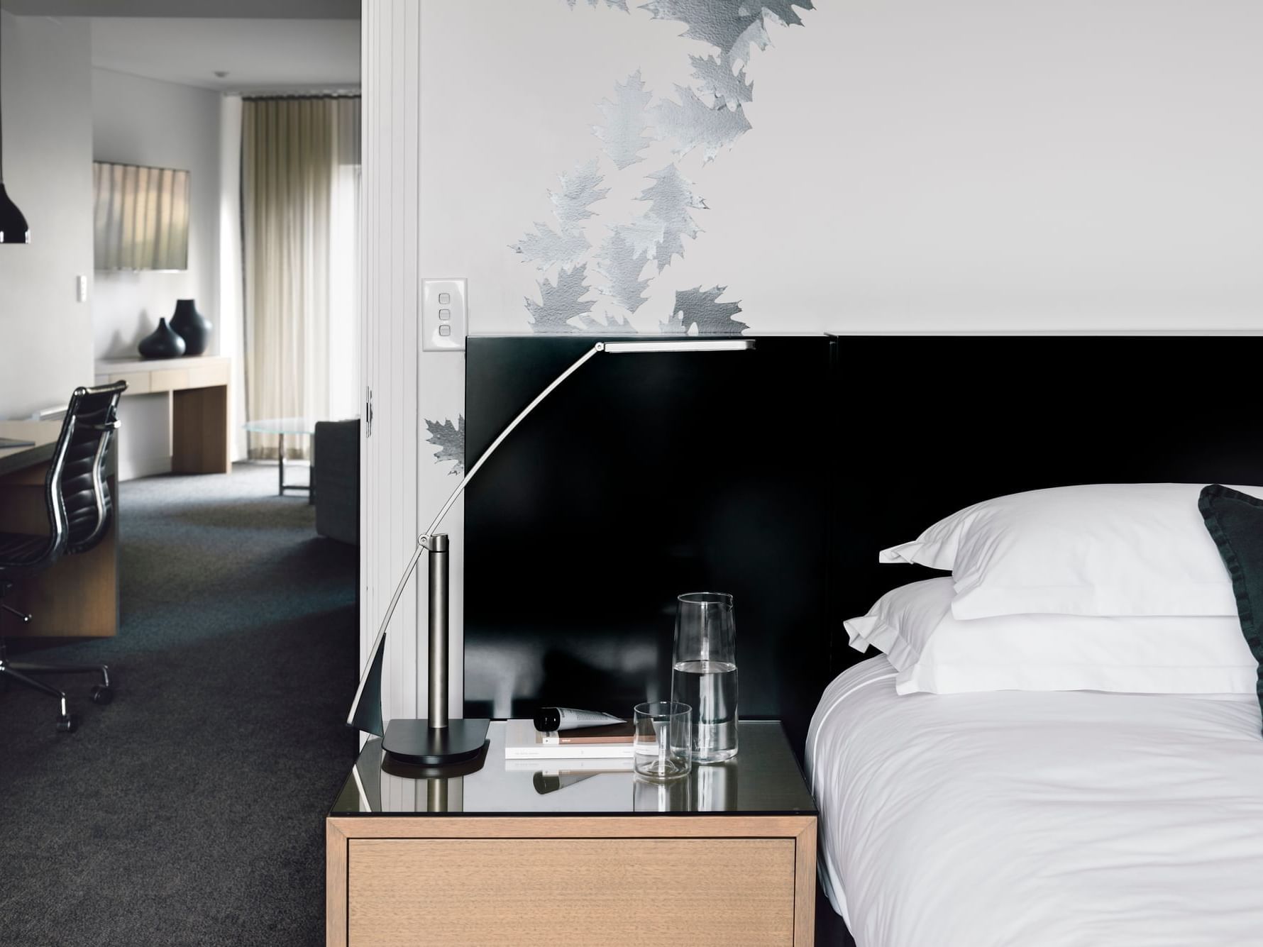 Bed & nightstand in 1 Bedroom Apartment at The Como Melbourne