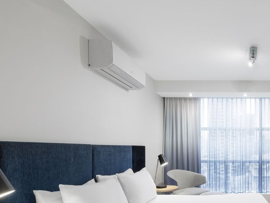 Bedhead with Air Conditioner in a room at Brady Hotels