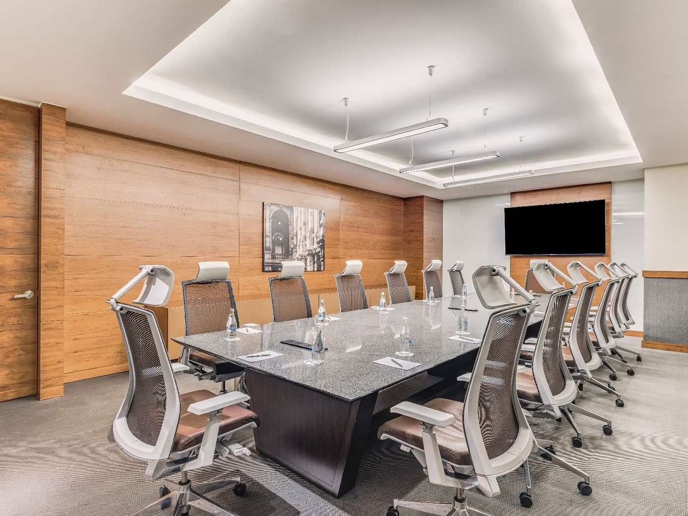 Boardroom type table setup in Mediterranean meeting room at Live Aqua Resorts and Residence Club