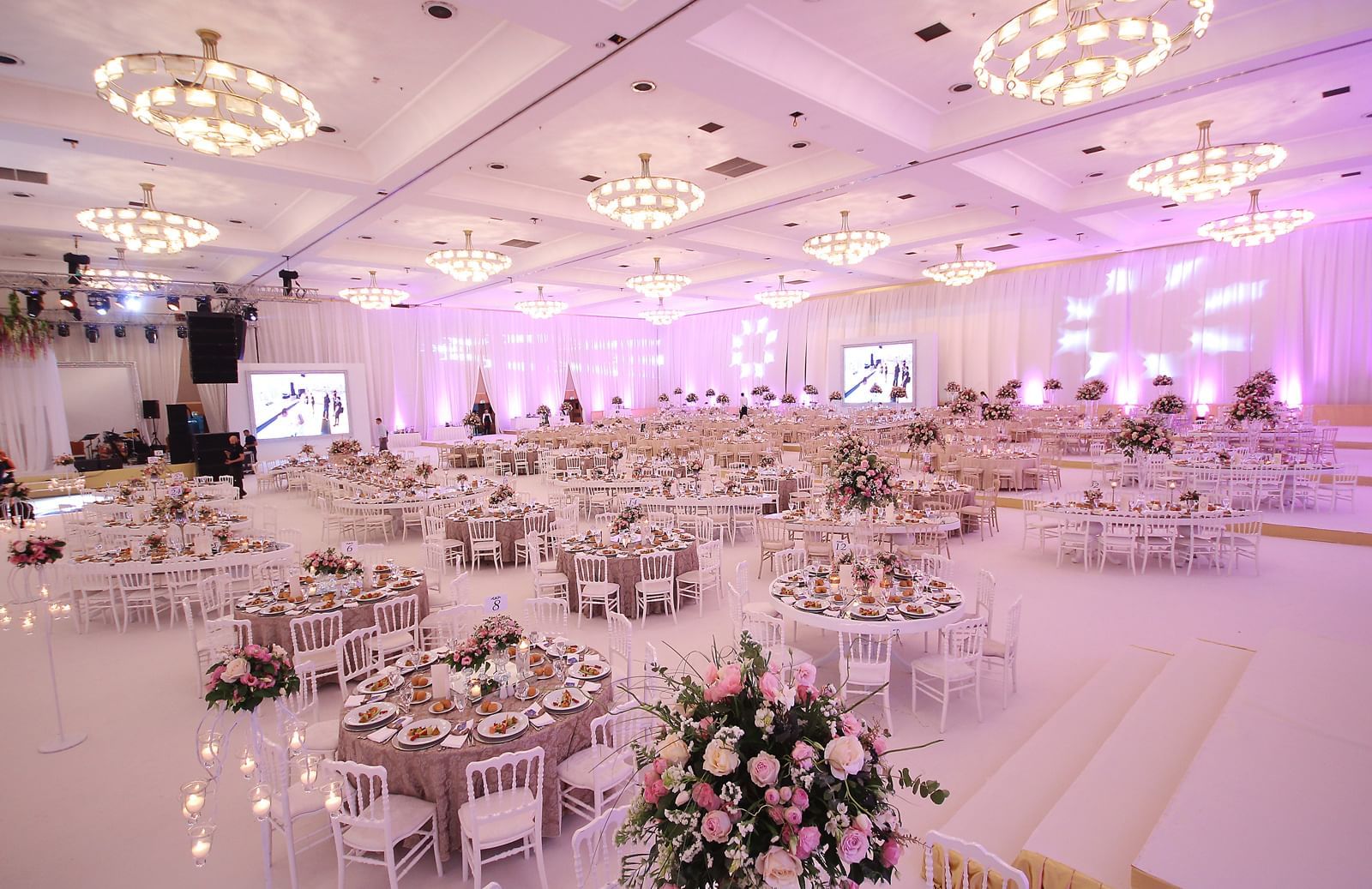 Wedding hall with round shape tables at Wow Hotels Group 