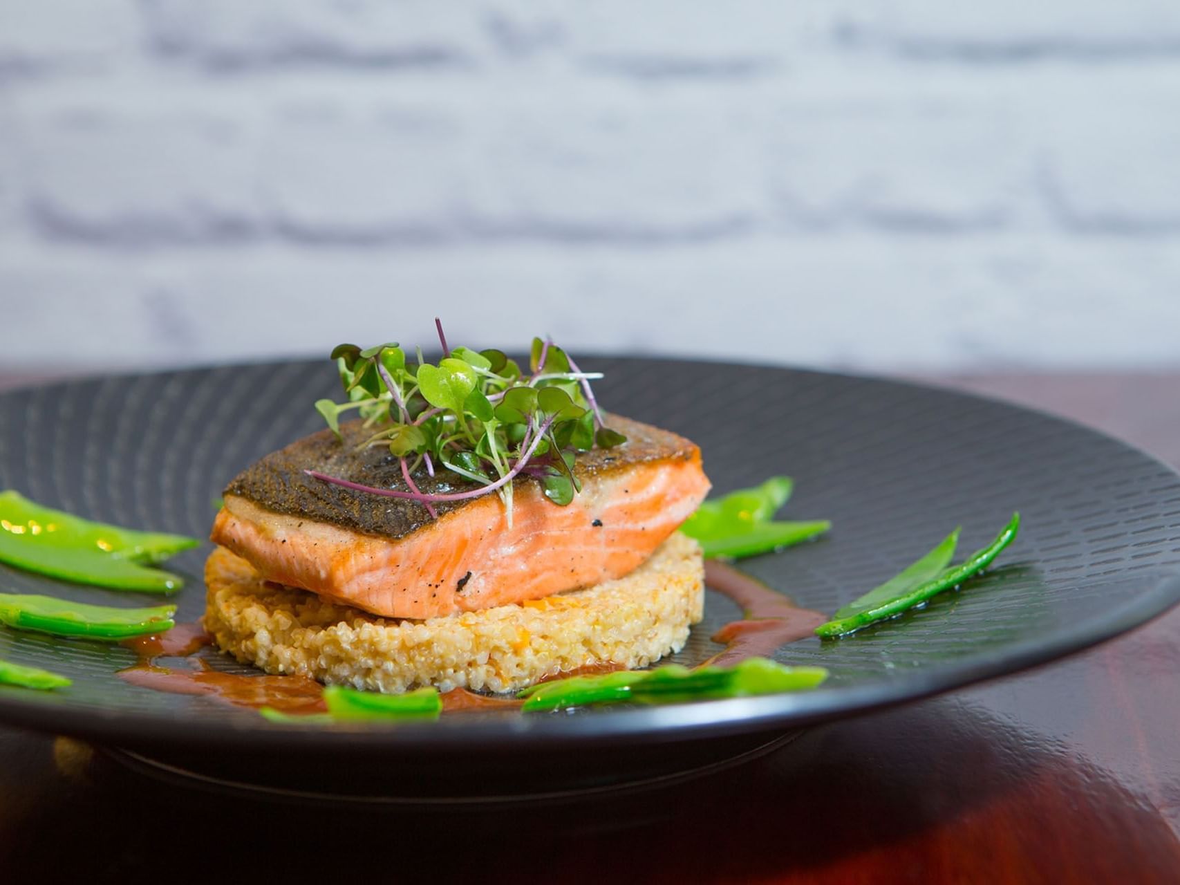 Salmon dish served in Sojourn Restaurant & Bar at James Cook Hotel