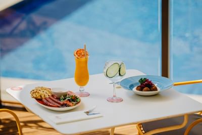 Fine dining by the pool at The Magnolia Hotel