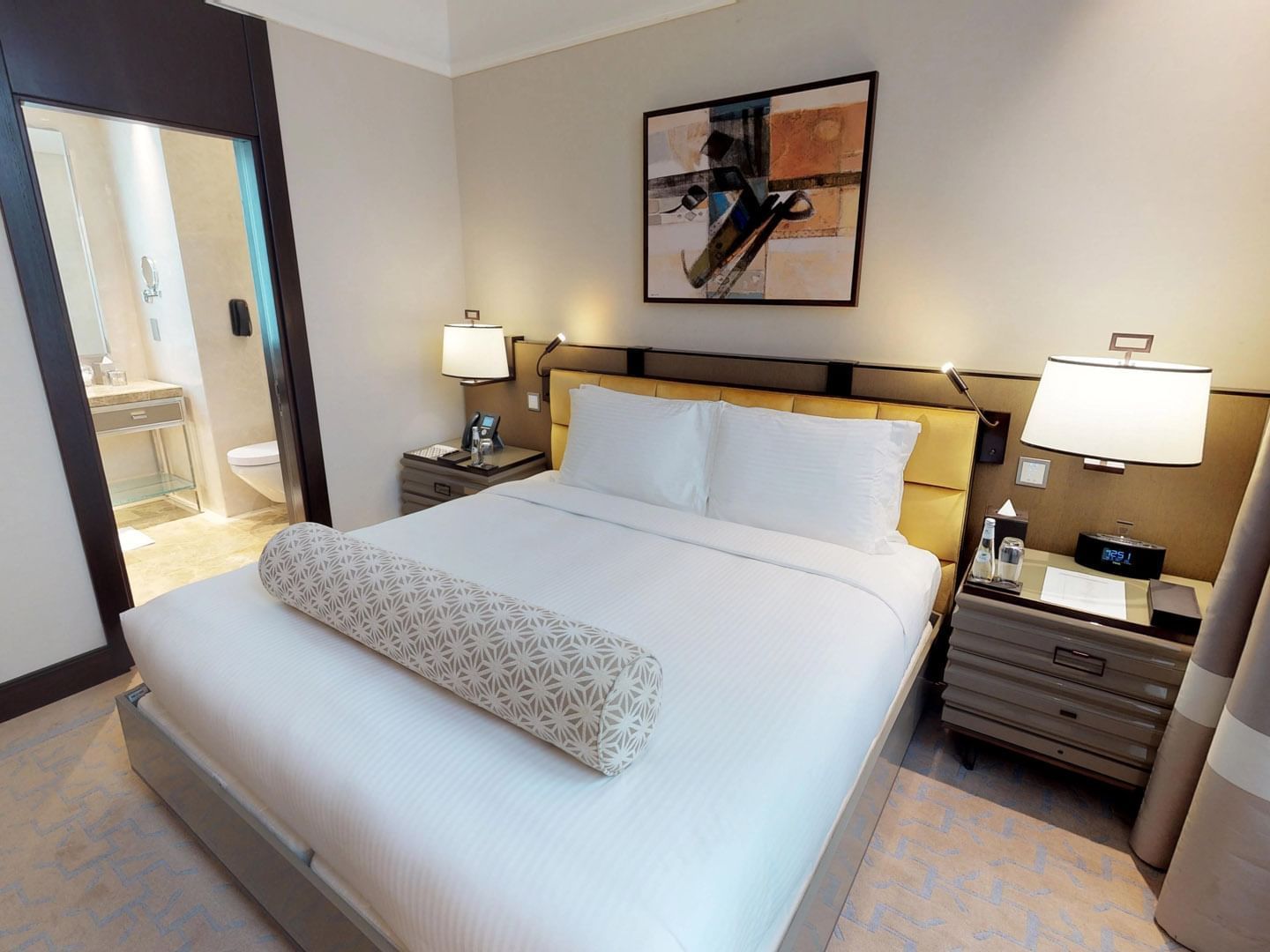 Interior of Divine suite with King size bed at Hotel Galleria