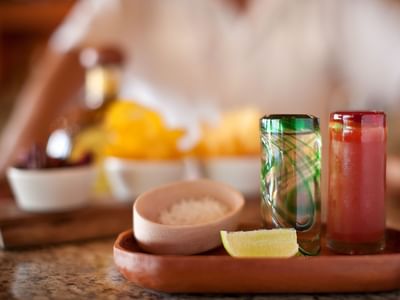 Close-up of salt, pepper with lemon served at Cala de Mar