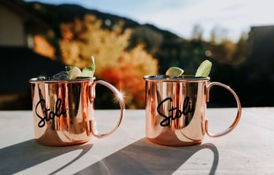 Moscow mules in copper mugs, outdoors at Adara Hotel