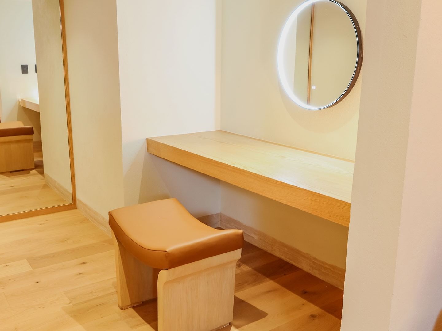 Wooden vanity and stool in King Superior Junior Suite at Camino Real Polanco Mexico Ciudad de Mexico.