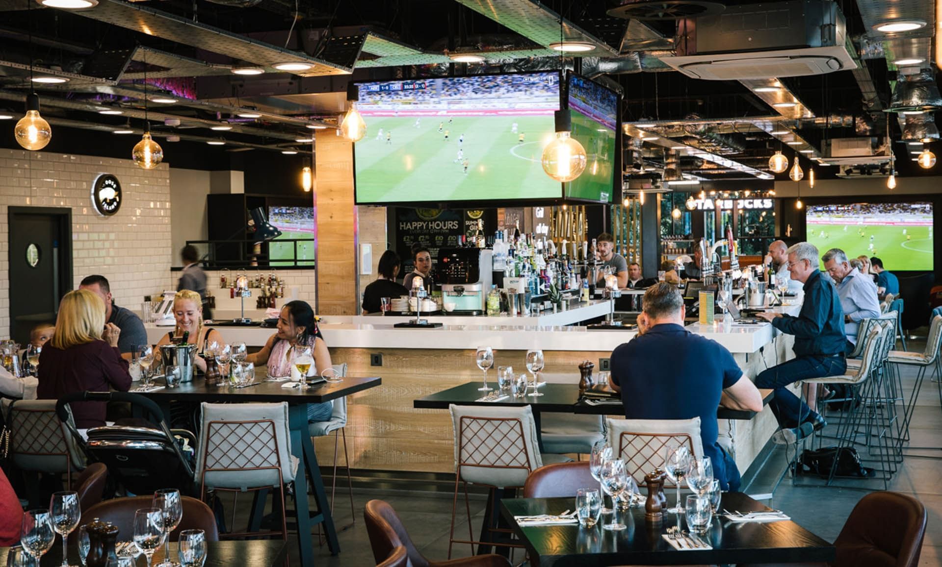 People Dining & lounging in a Restaurant at Village Hotels