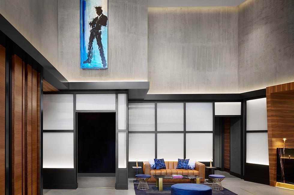 Modern lobby with sofas, coffee tables and wall art