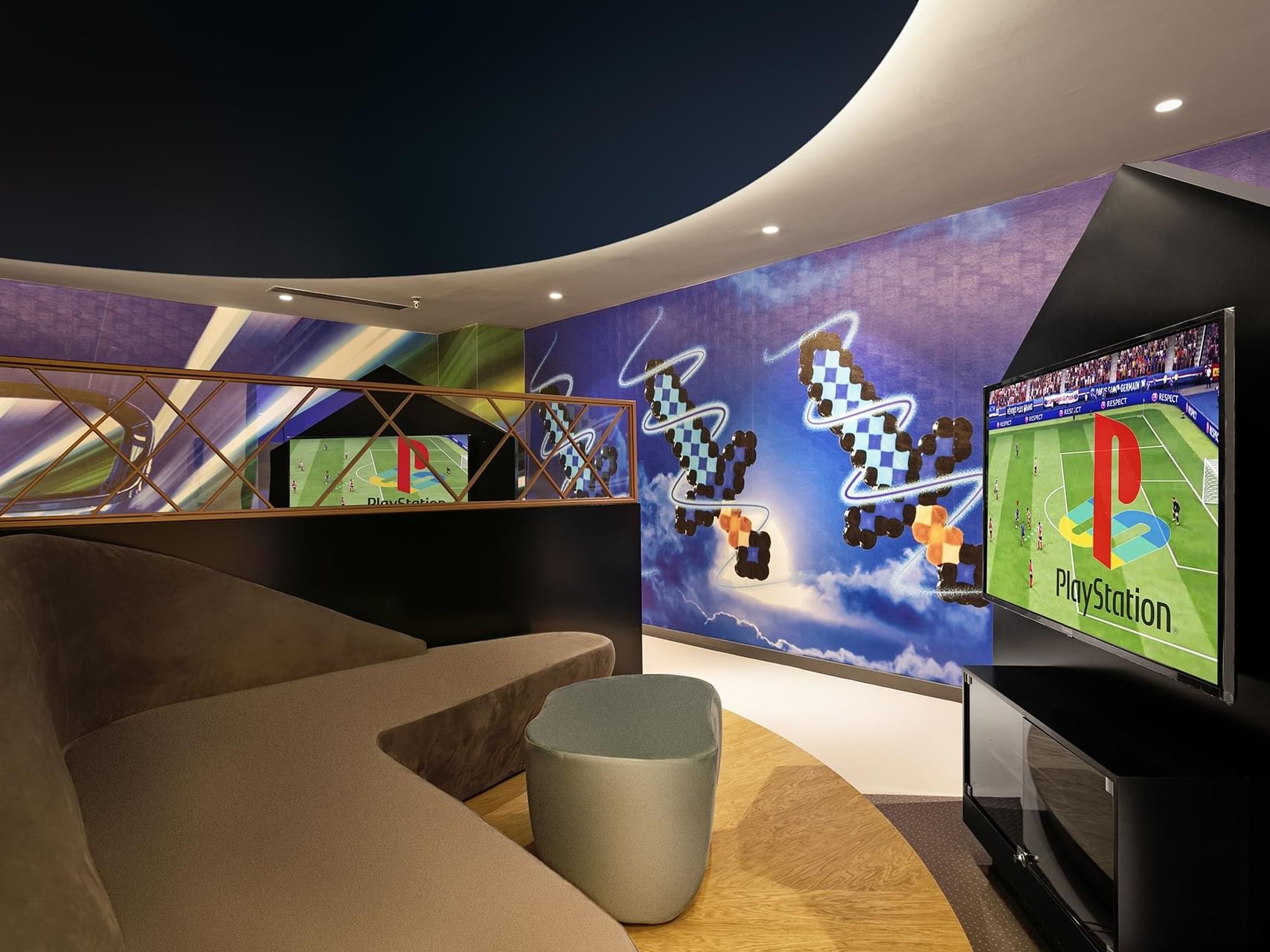 Gaming room with PlayStation branding, and cozy seating near Titanic Deluxe Golf Belek
