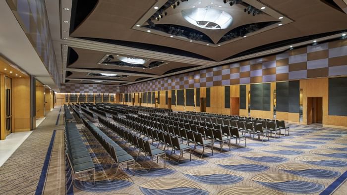 Rows of chairs arranged in The Grand Ballroom at The Fullerton Hotel Sydney