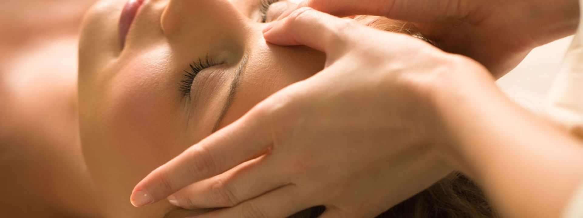 A woman having a head massage at Crown Perth Hotel