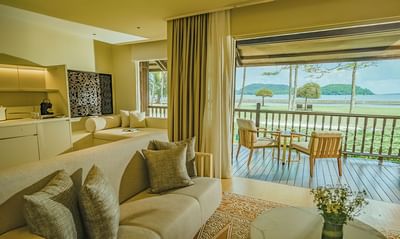 Sofa & balcony in Pelangi Suite at Pelangi Beach Resort & Spa
