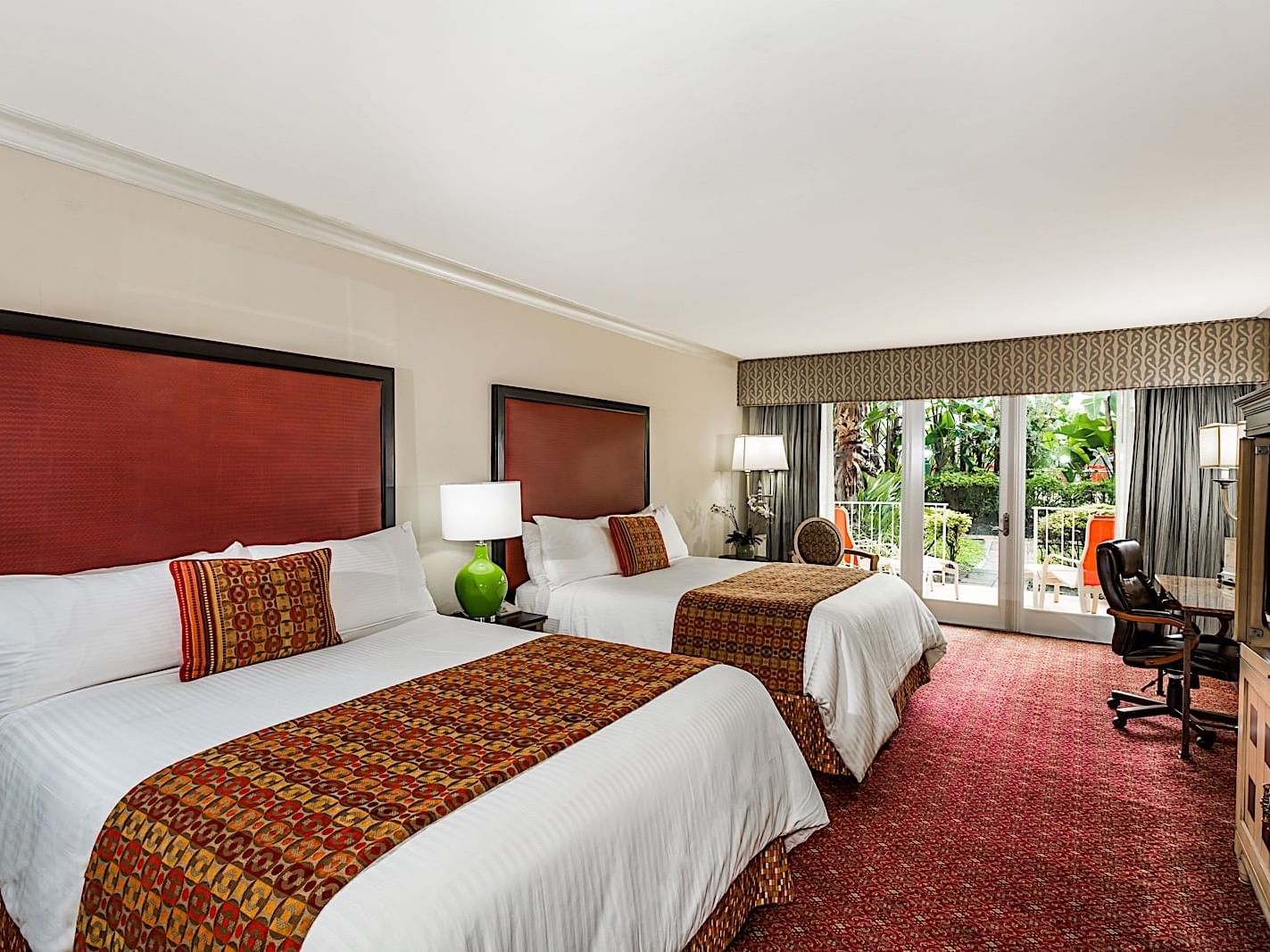 Two queen beds in poolside room at Safety Harbor & Resort