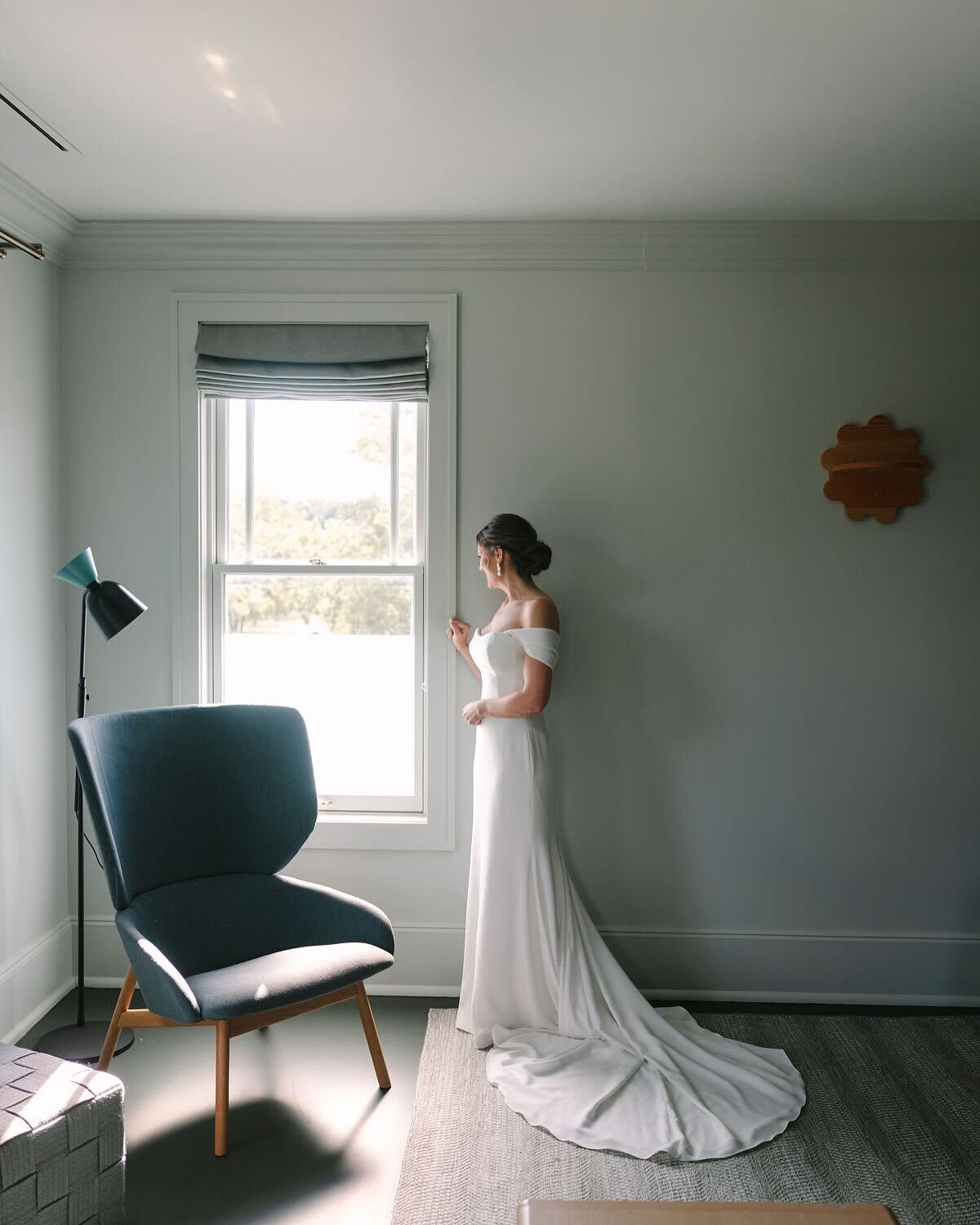 A bride longingly looking out towards her alter, excited to walk down her asle