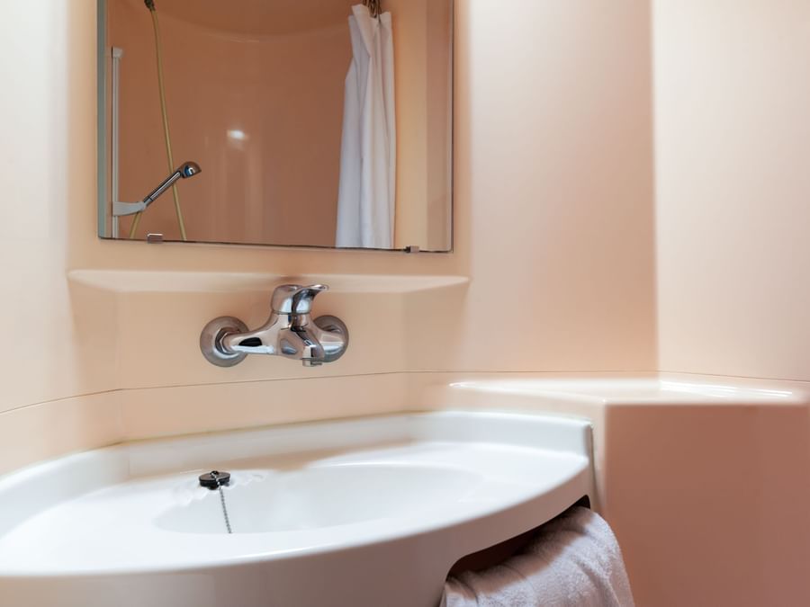 Bathroom vanity in bedrooms at Hotel Rouen South Oissel