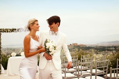 Newly married couple walking at St. George Lycabettus