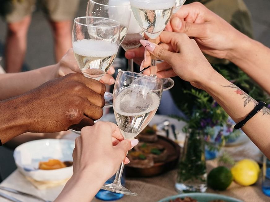 Picture of people toasting with champagne glasses