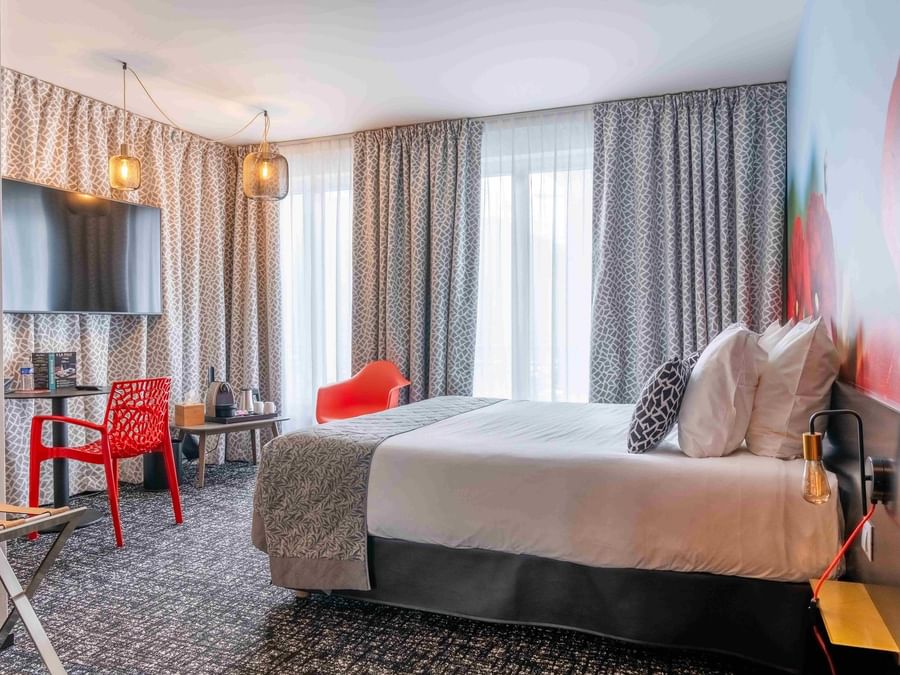 Chambre Privilège élégante et confortable avec lit double et décoration moderne à l'Hôtel de la Paix à Brest.