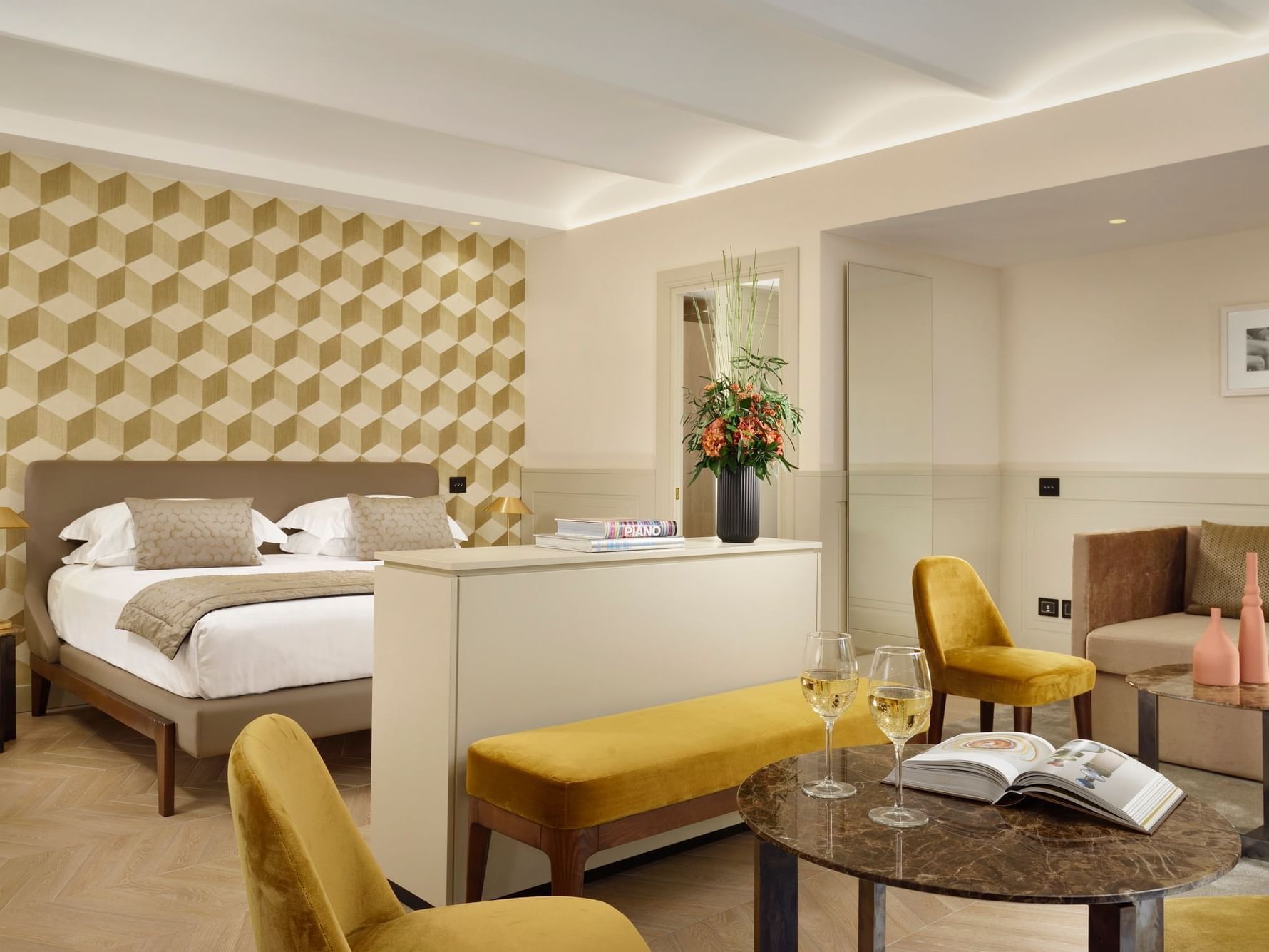 King-size bed arranged with cozy loungers in Studio Suite at Margutta 54