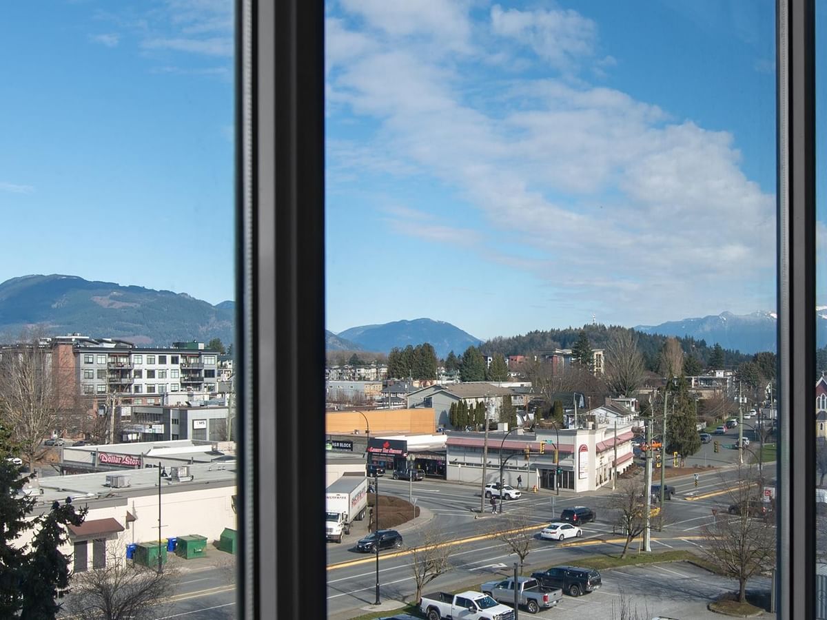 View from room window showing city and mountains at Coast Chilliwack Hotel by APA.
