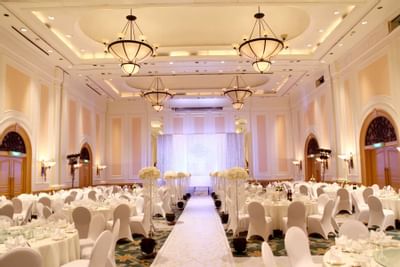 Reception with white tablecloths & flowers at Hanoi Daewoo Hotel