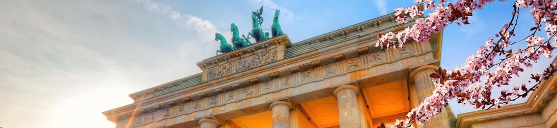 Low-angle view of Brandenburg Gate near Titanic Chaussee Berlin
