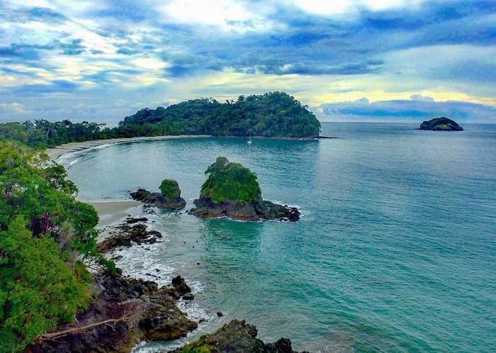 Aerial view of the sea around with the trees & rocks near Los Altos Resort