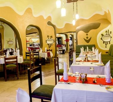 Tables With Cosy Chairs For Dining At Mara Serena Safari Lodge
