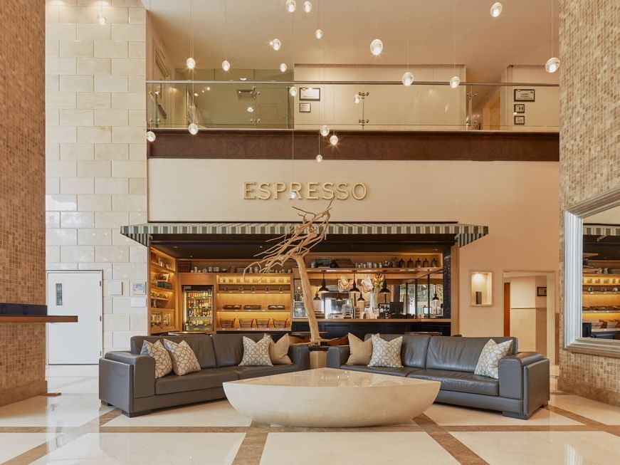 Couches in the lobby of Deli Cafe Expresso at La Colección