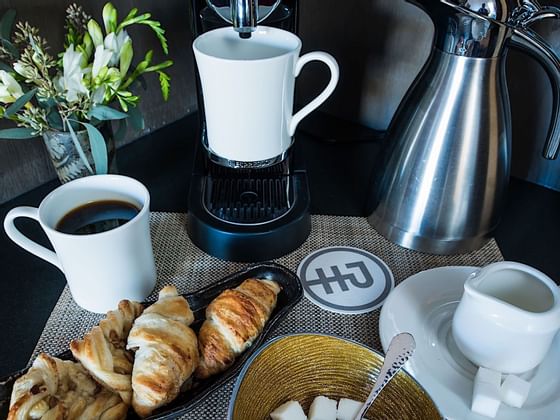 Croissants, coffee & flower vase served at Hotel Jackson