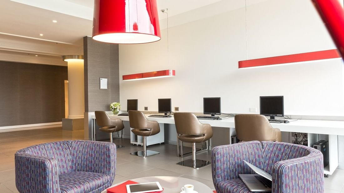 Arranged seating in business center at Pullman Albert Park