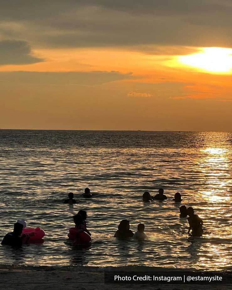 people swimming in the ocean