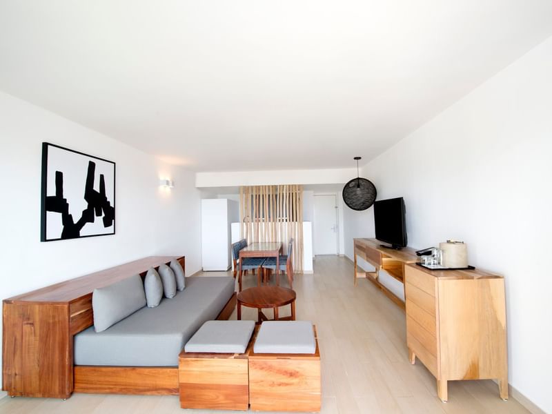 Living area of 2 Bedroom family Suite with a TV and a Couch at Fiesta Americana