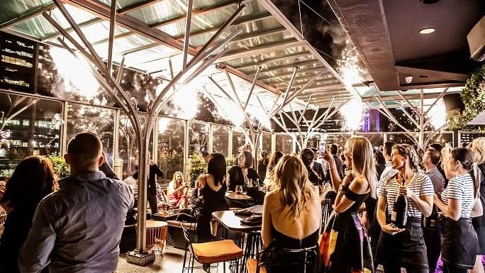Crowd in Sixteen Antlers Rooftop Bar at Pullman & Mercure Brisbane King George Square