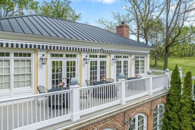 Elegant brick cottage with a balcony in Inn at Willow Grove