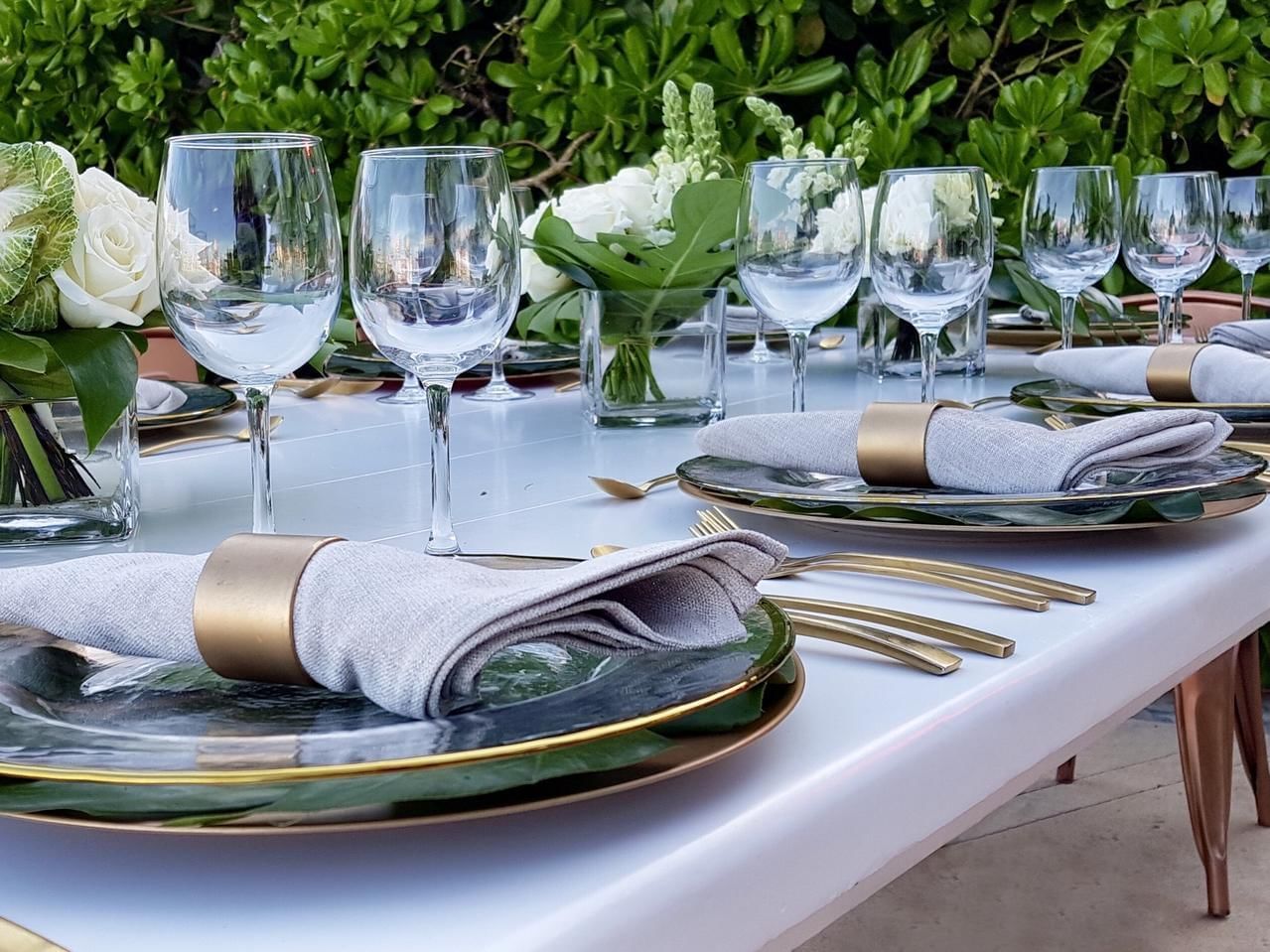 Table utensils on outdoor table setup at Grand Fiesta Americana