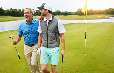 Two guys golfing in the golf course at Sunseeker Resort